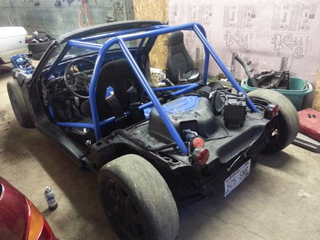 Illustration for article titled Track Day Genius Builds The Most Hilarious Miata 'Deathkart' Ever